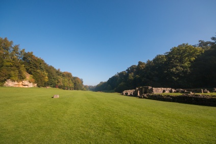 Looking down the valley of the River Skell from the abbey towards the water gardens. The ruins on the right are what remains of the Abbot's house. Photos from National Trust Fountains Abbey and Studley Royal Water Garden, in North Yorkshire.